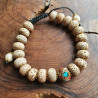 Bracelet mâlâ en graines de lotus et perle tibétaine