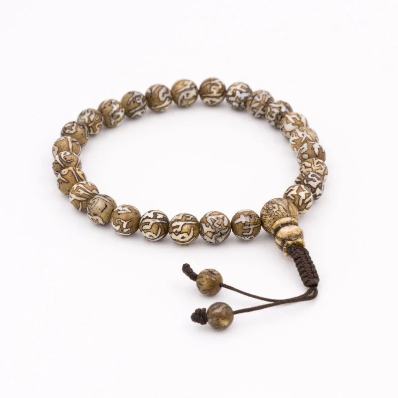 Bracelet coquillage gravé