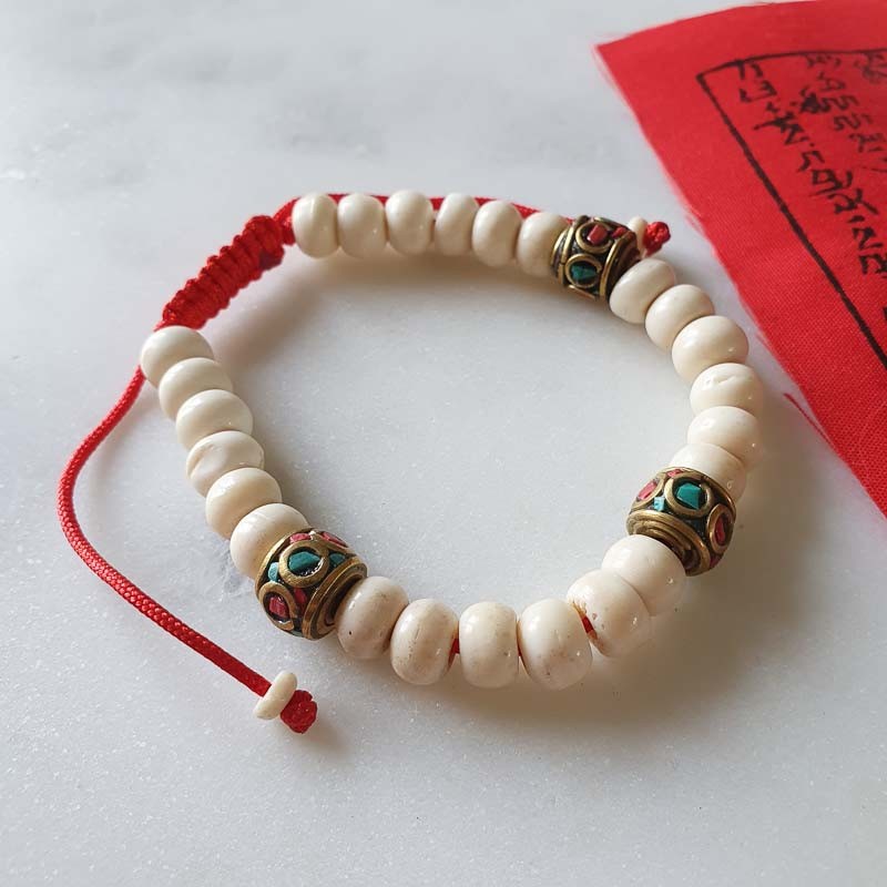 Bracelet mâlâ tibétain constitué de perles en os