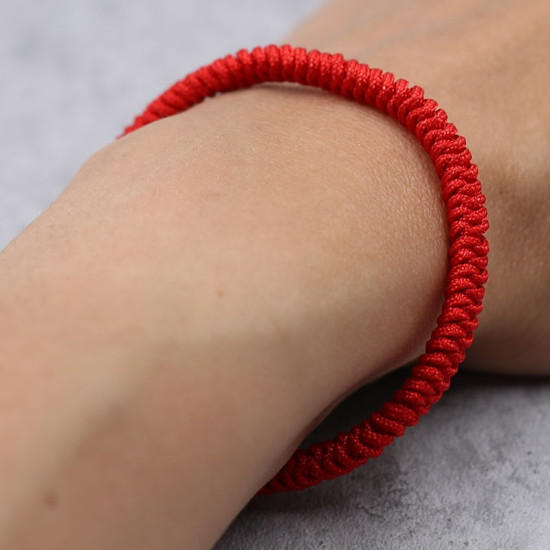 Bracelet porte-bonheur tibétain en fil rouge tressé