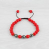 Bracelet mâlâ de perles rouges et pierre hématite