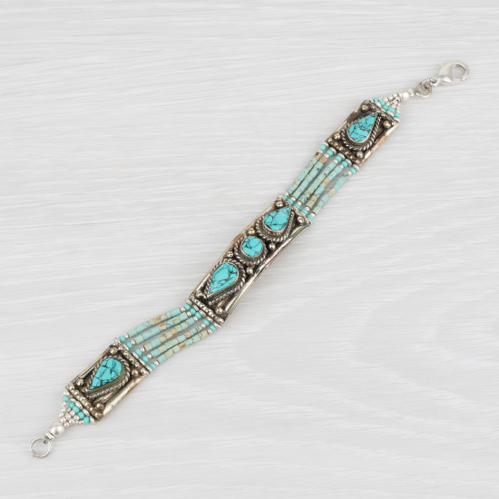 Bracelet tibétain incrusté de turquoises